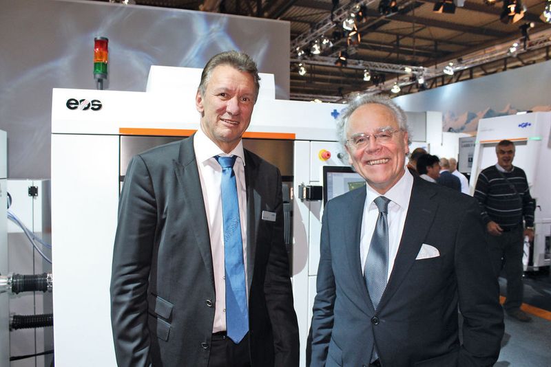 Pascal Boillat (left), head of GF Machining Solutions and Dr. Hans J. Langer, founder and CEO of EOS, talked to ETMM editor Barbara Schulz at EMO Milano 2015. (Source: Schulz)