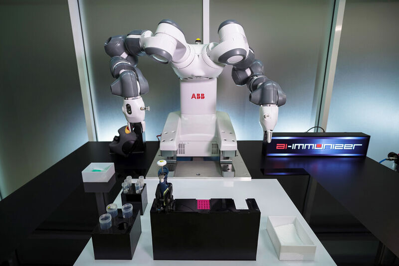 In Unit A, with its seven axes and two arms, YuMi handles the complete human immune neutralization testing process. (ABB / Mahidol University)