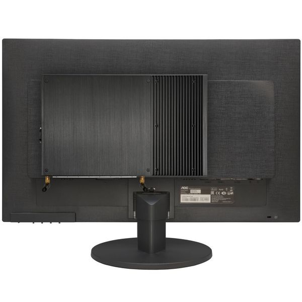 Mit einem VESA-Mount lässt sich der flache Rechner auf der Rückseite eines dafür ausgelegten Monitors befestigen, der so zum lautlosen All-in-One-PC wird.  (Aquado)