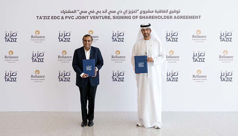 H.E. Dr. Al Jaber (Right) and Mukesh Ambani exchanged a signed framework agreement between Adnoc and Reliance.  (Adnoc)